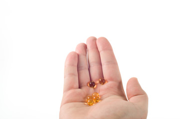 vitamins on the hand