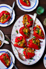  Stuffed Pepperoncini with a mozzarella, a pancetta and bread. Italian appetizer. top view. selective focus