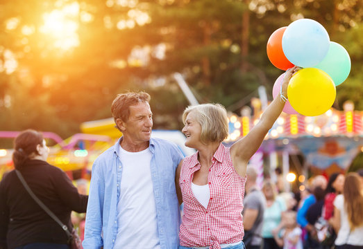 Senior Couple At The Fun Fair