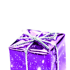 Violet  gift box with silver ribbon, bow and snowflakes  isolate