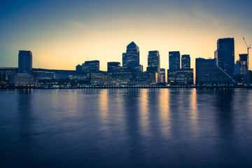 Fototapeta na wymiar Canary Wharf modern buildings in London on river Thames