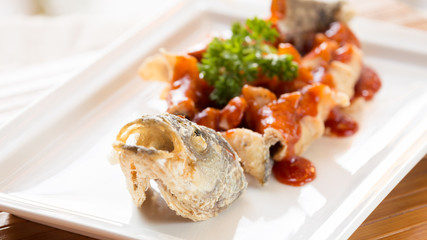 Japanese style fried sea bass, served with sweet and sour sauce