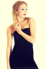 Fototapeta premium Young woman wearing party dress.