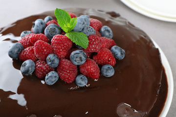Delicious chocolate cake with summer berries, closeup