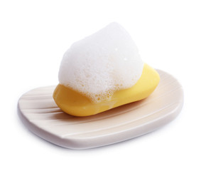 Soap with foam isolated on white