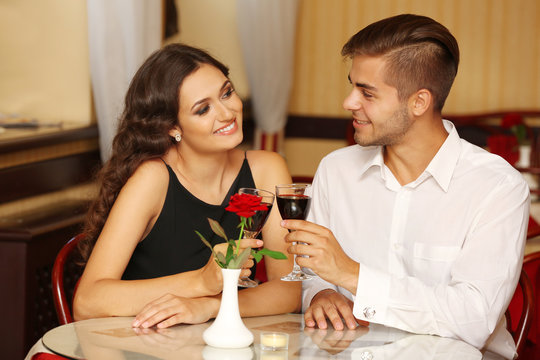couple in love cheers at the restaurant