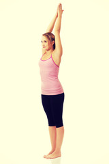 Fototapeta na wymiar Young woman doing aerobic exercise.