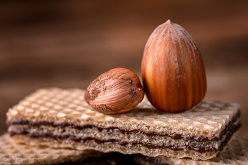 wafer and hazelnut on wood