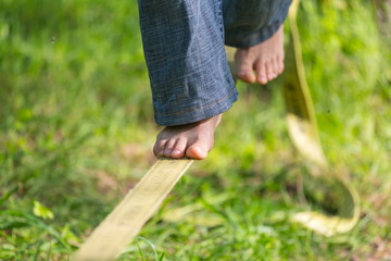 Slacklining in the summer park