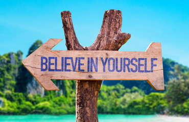 Believe in Yourself arrow with beach background