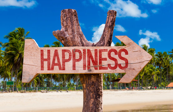 Happiness arrow with beach background