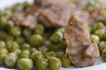 veal stew with peas