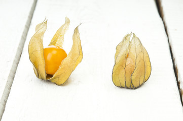 Physalis on the wooden table