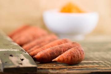 Carrots on an old table