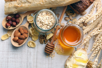 Healthy breakfast with bread, honey, nuts. Country breakfast concept