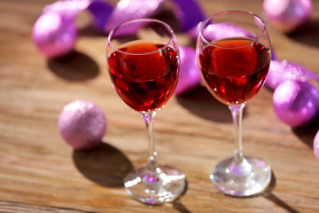 Wine and Christmas decoration on bright background