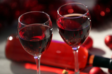 Wine and Christmas decoration on wooden table