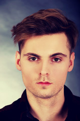 Obraz premium Young serious man.