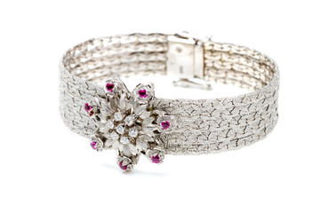 Expensive white gold bracelet with diamonds on a white background