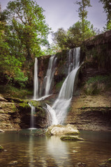 Fototapeta premium Waterfall and river in the forest
