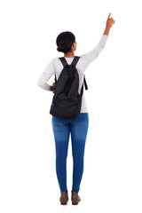 back view of african college girl pointing empty space