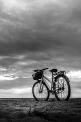 Obraz premium Black and white image view low sand with bicycle