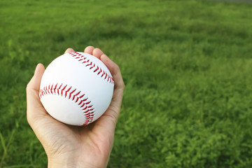 Hand holding the ball