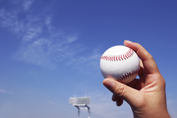 Baseball field and a ball and a blue sky