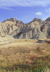 Fototapeta na wymiar Badlands landscape, formed by deposition and erosion by wind and water, contains some of the richest fossil beds in the world, Badlands National Park, South Dakota, USA