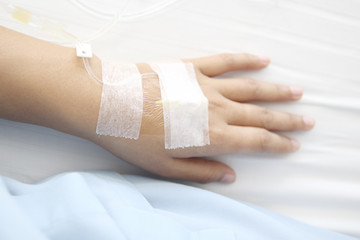 Close up saline IV drip for patient and Infusion pump in hospita