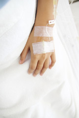 Close up saline IV drip for patient and Infusion pump in hospita