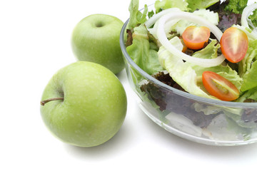 Healthy bowl of salad on white with copy space