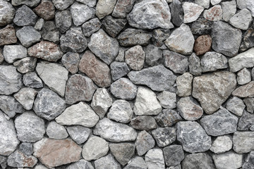 Stone wall, rock texture background - Stock Image