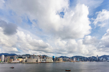 Naklejka premium channel with skyscrapers aside