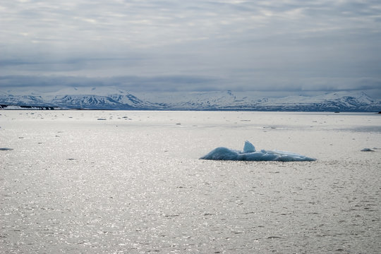 Icebergs floating in the arctic sea in Svalbard