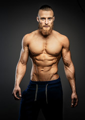 Athletic muscular bearded guy.