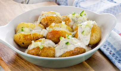 Hot Baked potato with chives and cream.
