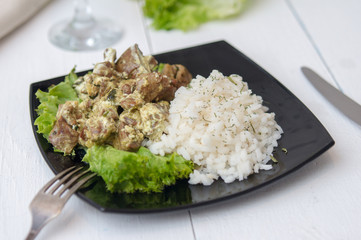 chicken liver with rice garnish