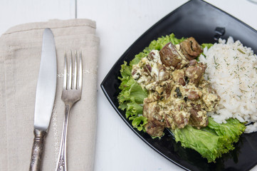 chicken liver with rice garnish