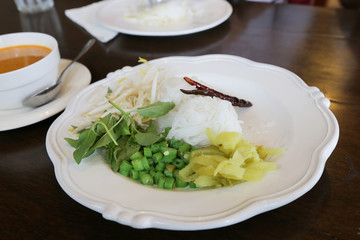 boiled Thai rice vermicelli, usually eaten with curries and vege