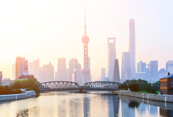 landmarks and a bridge of shanghai on the shore