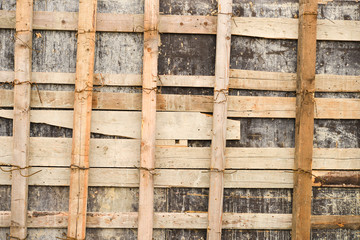 close up of a wooden scaffolding for repairing a stadium