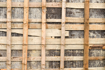 close up of a wooden scaffolding for repairing a stadium