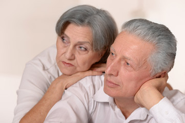Sad senior couple