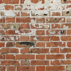 Red Brick Wall With Damaged White  Plaster Frame Background