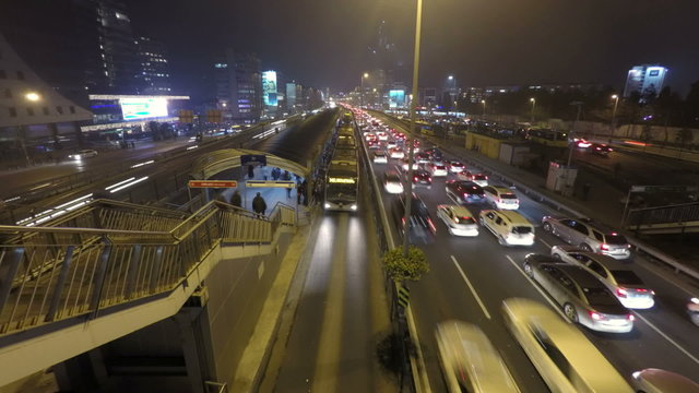 Time lapse video of a rush hour traffic flow at night in Mecidiyekoy, Istanbul,