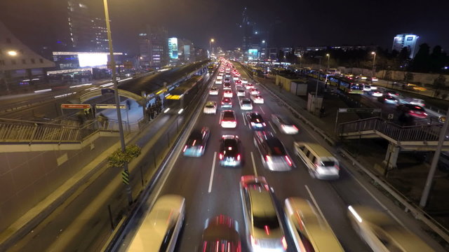 Time lapse video of a rush hour traffic flow at night in Mecidiyekoy, Istanbul,