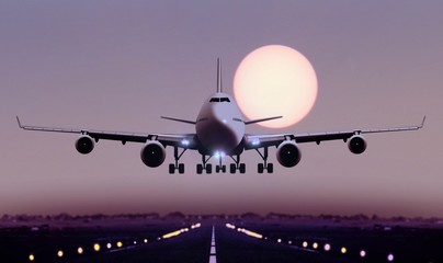 Airplane touch down during sunset