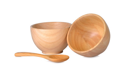 Cups and wooden spoons on white background