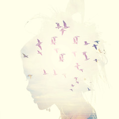 Womans head and birds flying, double exposure, freedom and liberty background.